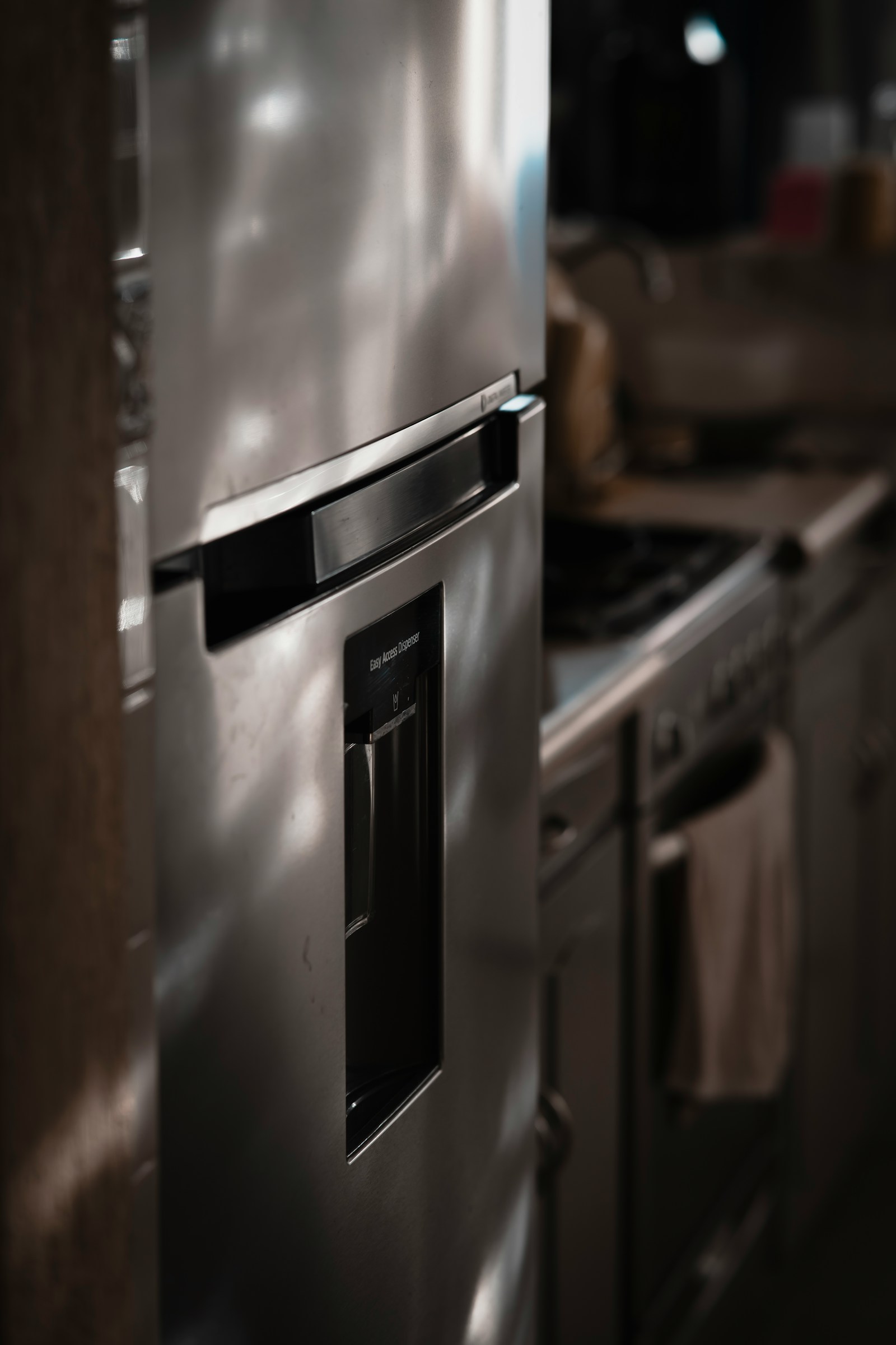 Panel-ready dishwasher integrated into custom Naples kitchen cabinetry