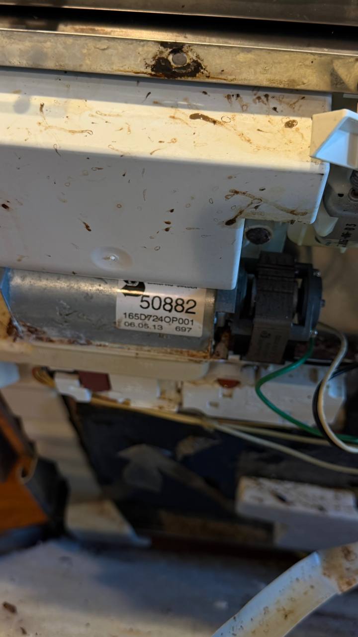 GE Profile dishwasher motor and pump assembly close-up